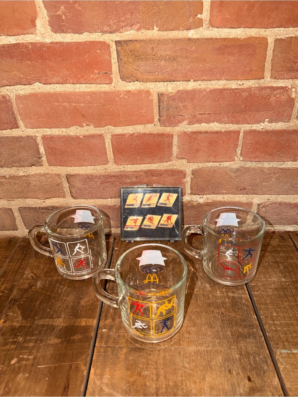 McDonald's Olympics Pins & Glass Mugs with Red, Yellow, Blue Sport Icons Clear